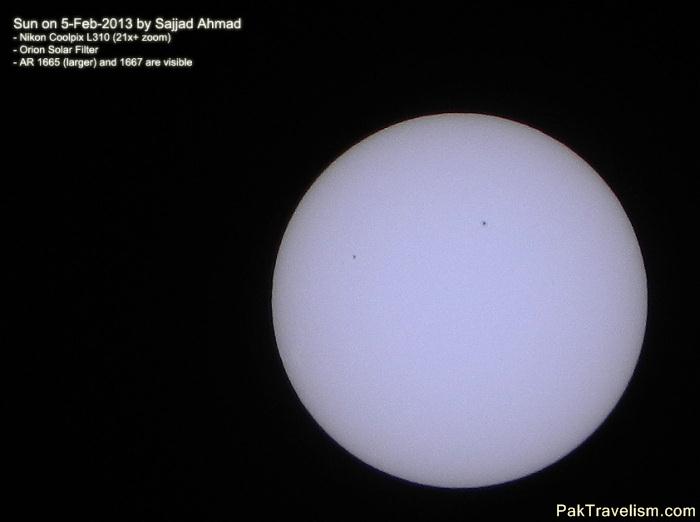 Sun with sunspots.