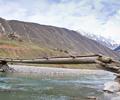 Wooden bridge over river Kunhar.